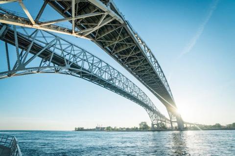 The Blue Water Bridge connects Port Huron, Michigan, with Sarnia, Ontario. PURE MICHIGAN