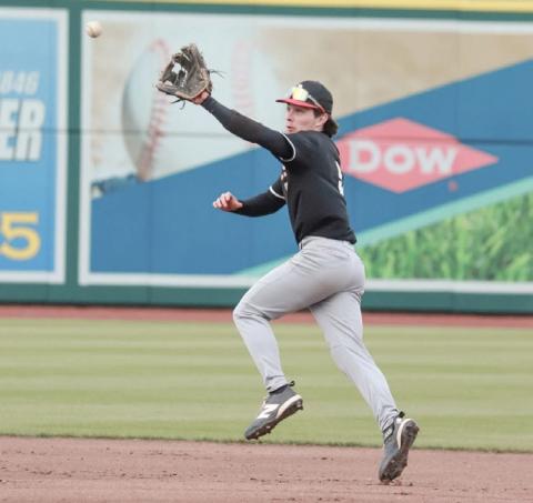 Karter Offenbecker makes a play on the infield during Beaverton’s successful trip to Dow Diamond on Thursday. PHOTO BY TERINA BARTA