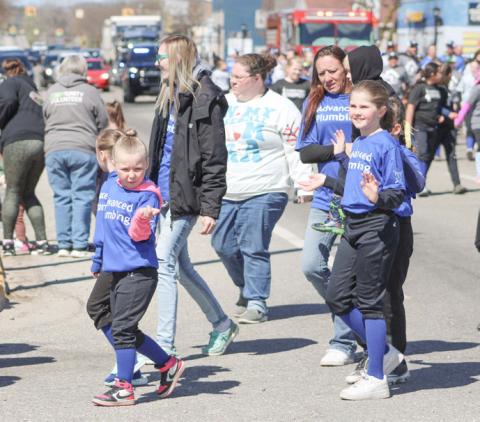 OPENING DAY PARADE FILLS THE STREET