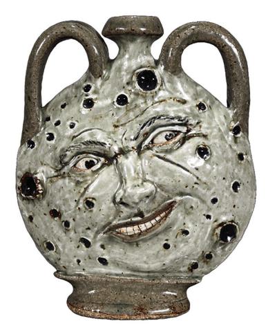 This contemporary manin- the-moon jug recalls both Southern folk pottery and Chinese moon flasks.