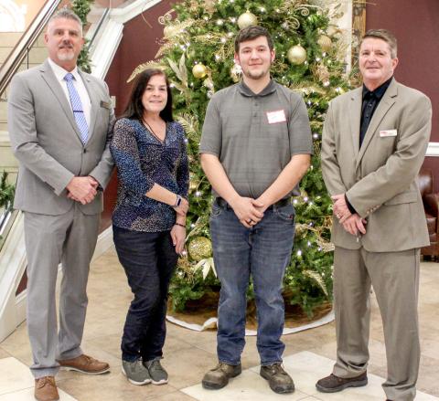 Pictured left to right are State Representative Mike Hoadley, Gladwin County Commissioner Karen Moore, Jason Ash, and Michigan Works! Region 7B Executive Director Mark L. Berdan.