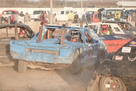 Max Holmes III of Beaverton fights his way through the traffic during the Figure 8 race Saturday at the Gladwin County Fairgrounds.