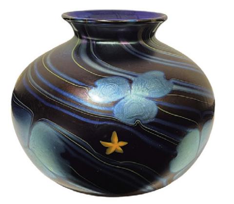 Art glass isn’t always antique. This vase made by Lundberg Studios in the 1970s combines classic techniques with modern sensibilities. RIVICH AUCTION
