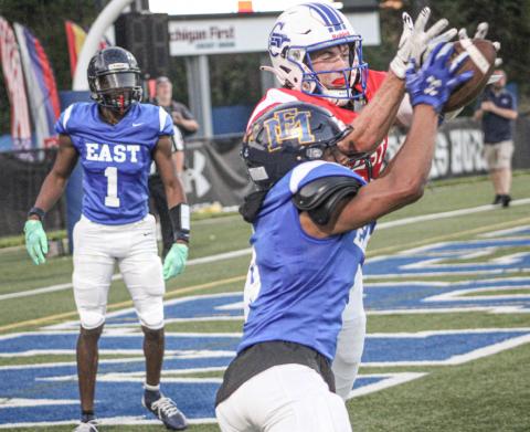 Gladwin’s Trace Corlew breaks up a pass at the goal line during the third quarter of the Michigan High School Football Coaches Association East-West All-Star Game Saturday at Lawrence Tech University in Southfield.