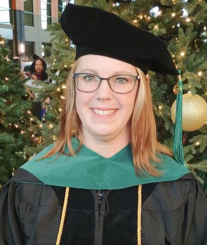 LUCKE RECEIVES PHD