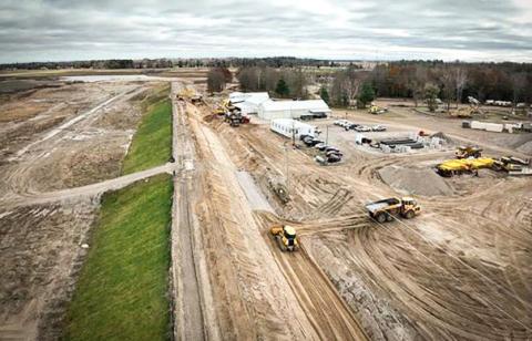 Pictured is the Edenville Dam under construction. PHOTO PROVIDED BY FISHER CONTRACTING COMPANY