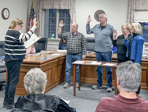 Gladwin City Council members Dave Crawford, John Caffery, Jamie Sischo, and Deb Platt were sworn in at the Gladwin City Council meeting on December 2.