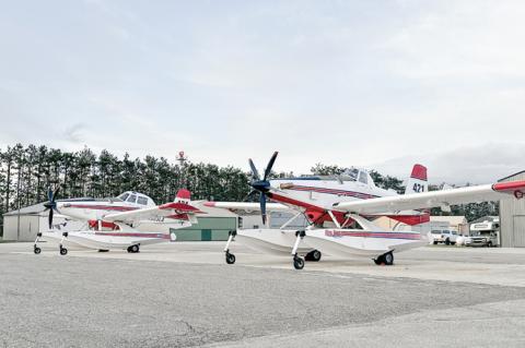 These planes – Air Tractor AT-802 models modified to scoop water for wildland firefighting – are flying for the DNR during the spring fire season.