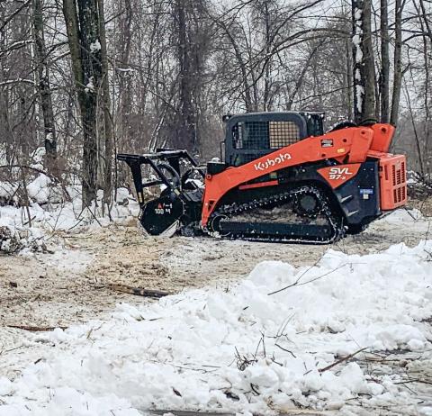 Forestry mowing of invasive plant species being done at Gladwin City Park.