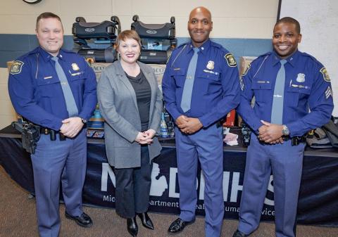 Pictured left to right are: Insp. Barry Schrader, MSP Field Services Bureau; MDHHS Director Elizabeth Hertel; MSP Director Col. James F. Grady II; Sgt. Ronnie Evans, MSP Planning, Research and Accreditation Section.