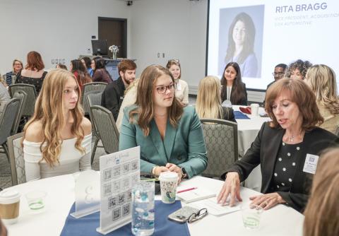 Students interact with industry professionals during the Driven by Women Automotive Roundtable at the 2024 Northwood University International Auto Show.
