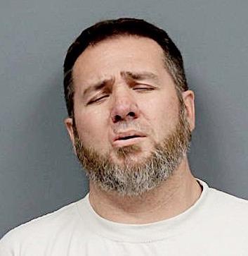 Gasoline assault leads to arrest