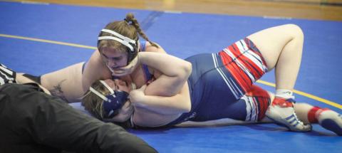 Gladwin’s Caiden Ross battles it out during a recent match. The Flying G’s opened the Jack Pine Conference dual meet season with a pair of wins last week.