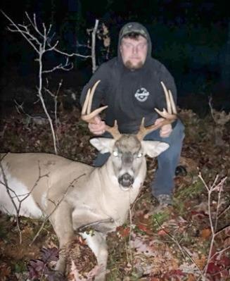 Nicolas Patnode, 19, of Kalkaska poses with an illegal 9-point deer he killed in 2022. Patnode and Zander Garrett face a combined 14 charges after torturing a porcupine and illegally hunting throughout the county during October-November 2022. Both Kalkaska men are due back in court on May 20.