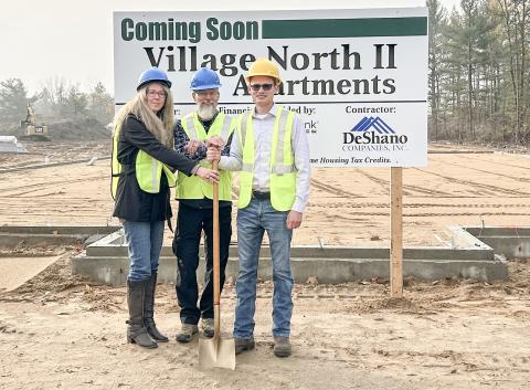The groundbreaking ceremony for the Village North II apartments occurred on Tuesday, October 29. From left to right are Trisha, Chad, and Boone DeShano.