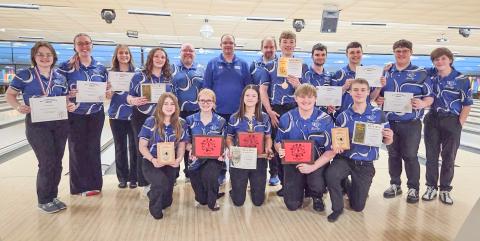 Gladwin’s bowlers pose with their prizes after a big year in the Jack Pine Conference ended Saturday at Riverwood Resort. In the front row (left to right) are: Payton Sanders, Ryleigh Sanders, Angelica Corlew, Jaden Willis, Hunter Davy. In the back row are: Madeline Crawford, Josie Pollock, Alexis Farrow, Brittany Crawford, Coach Crawford, Coach VanTiem, Coach Hager, Carson Hindman, Dylan Moore, Wade Roehrs, Riley Banfield, and Noah Raymond.
