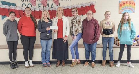 Pictured from left to right: Hadley Green, Mayela Cordova, Kari Wedge, Ann Sigsby, Ashlee Moore, Darci Cole, Heidi Cole, and Angelina Cole.