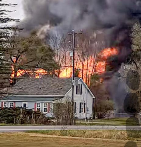 Old farm barn engulfed in fire