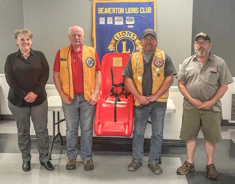 Pictured from left to right are Beaverton City Manager Shannon Siprilla, Lions Treasurer Al Bornick, President Bob Killian, and Beaverton Mayor Ray Nau.