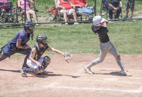 Sean Barta rips a hit during Beaverton’s Division 3 district semifinal victory over Farwell Friday.