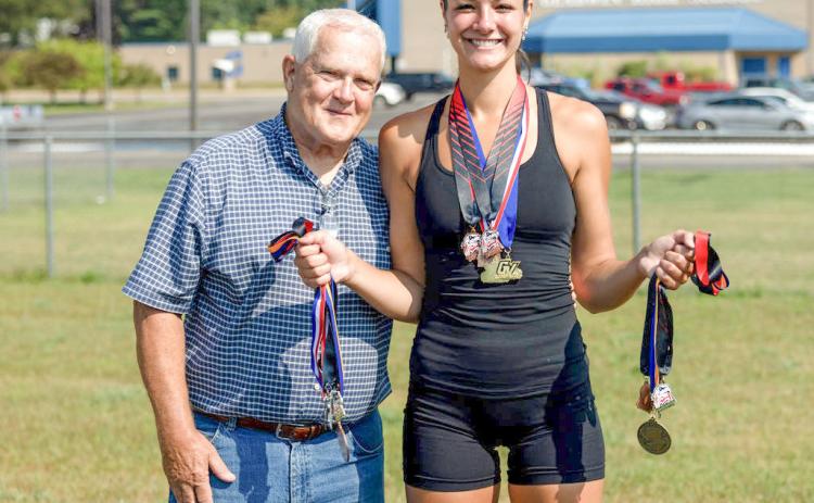 Ava Gary, pictured with her Gladwin High School Track Coach, Kernie Gilliam.