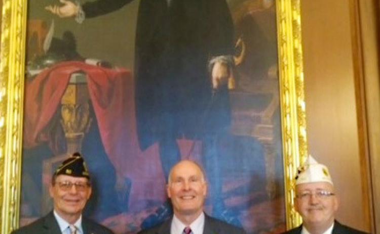 Pictured left to right are: John M. Mella, Congressman John Moolenar, and Gary Easterling.