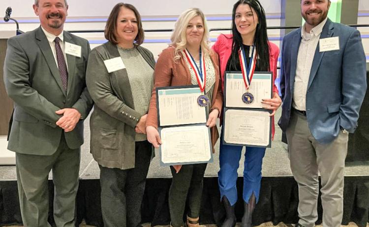 Pictured left to right: Mid Michigan College President, Tim Hood; Mid Michigan College Board of Trustees Chair, Jane Zdrojewski; Brittany Ames, Shantelle Thornton, and Mid Michigan College Trustee, Nate Weisenburger.