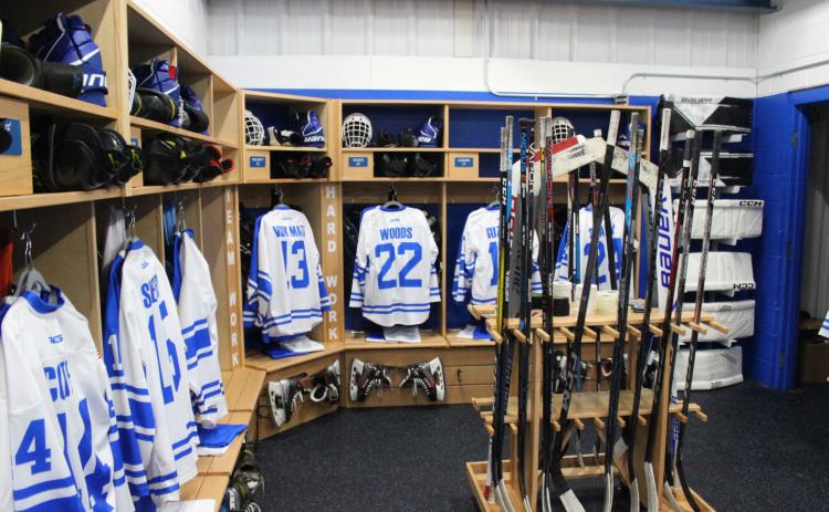 Pictured is the new locker room at the Gladwin Community Arena. Inset photo , left to right are: Jake Wyrembelski, Jim Cook, and Al von Matt.