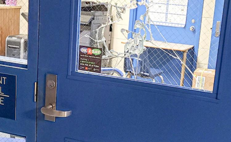 Local man arrested after high school break-in