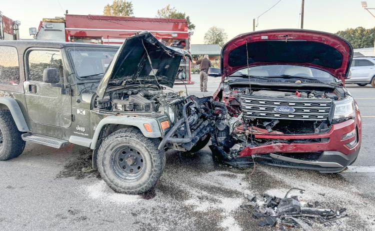 Two vehicles collide in front of McDonald’s