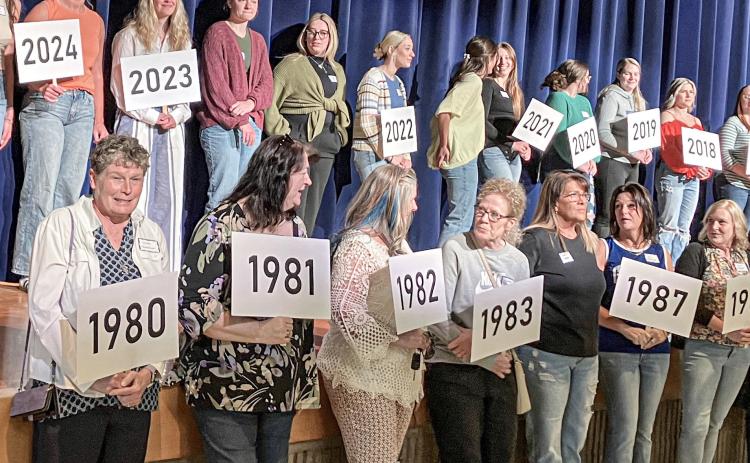 GLADWIN HONORS TRACK COACH GILLIAM