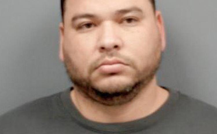 Alleged counterfeiter arrested