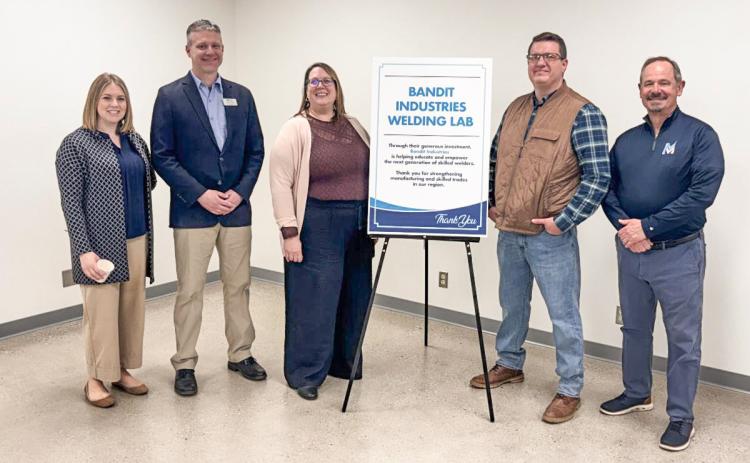 Pictured are Bandit Industry Reps standing alongside Mid Michigan College officials: Alexa Carey, Executive Director of the Mid Michigan College Foundation; Shawn Troy, Dean of Workforce &amp; Career Education; Jody Thompson, Director of Human Resources; Corey Schafer, Director of Parts and Service; and Tim Hood, Mid Michigan College President.