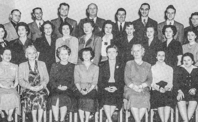 Pictured in bottom row: Harriet Martin, Flossie Cady, Mary Stockton, Helen Woodby, Minnie Schrader, Sadie Bergman, Margaret Newell, Margaret Lankin. Second row: Marie Crosby, Blanche Strouse, Vera Wagar, Mary Keough, Jean Singer, Virginia Ross, Paula Schumacher, Jean Wilson, Donna Grisdale, Cecille Farling. Third row: Fred Woodby, Rex Stockton, Edward Wodek, Paul Madison, Clarence Metzger, Harold Broka, Guerdon Schumacher, Leon Methner.