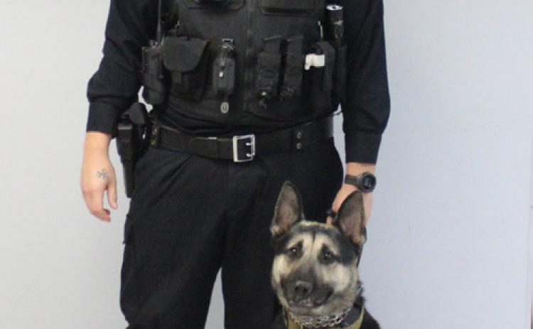 Pictured is Zac Noble and his K-9 Lux.