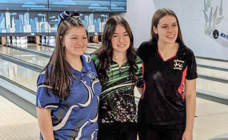 Pictured left to right, champion Juliona Corlew (Gladwin). Center, Lexi Drouse (Pinconning). Right, Kaelyn Fischer (Beaverton).
