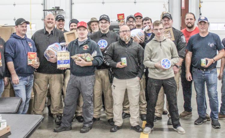 Meals were packed for delivery at the Beaverton Fire Department last year during the 7th annual Thanksgiving Dinner giveaway in 2023.