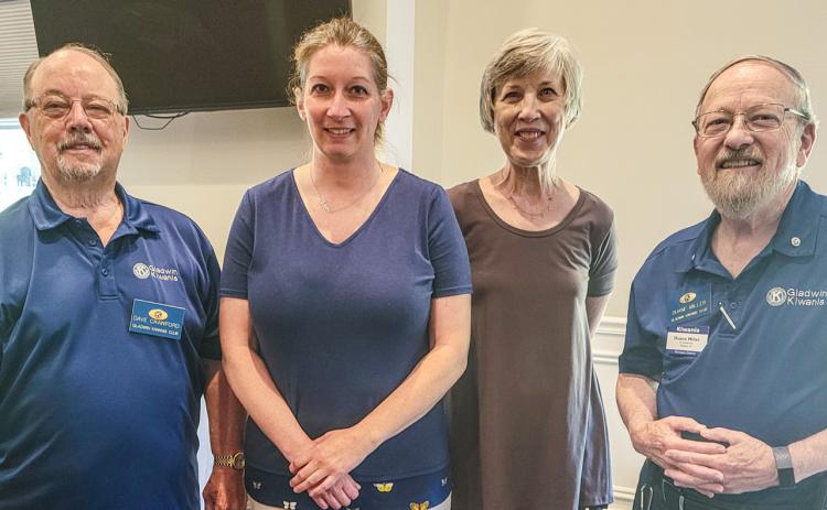 Pictured left to right: Dave Crawford, President; Carrie Will, Lori Johnson and Duane Miller, Membership Chairperson.