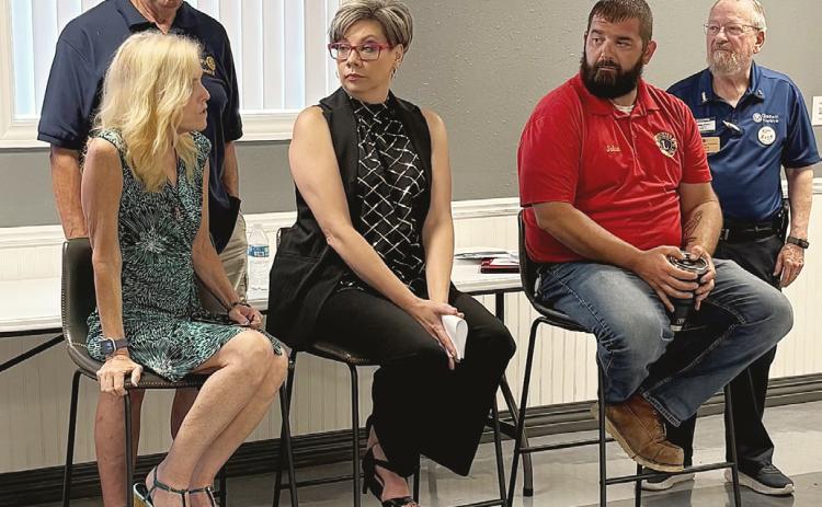 Pictured in back, George Alward; in front, left to right: Karen Moore, Angela Bigham, John Andrist, and Dwayne Miller.