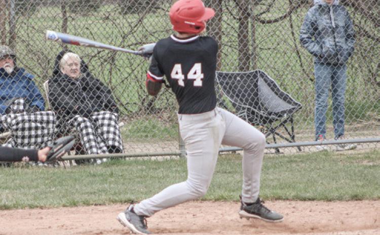 Beaverton’s Dakota Knake rips a hit during a recent game.