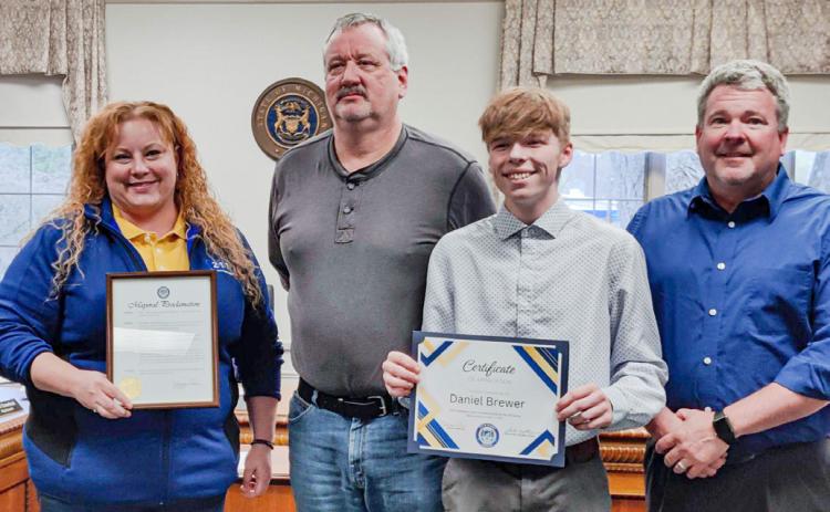 Pictured are Sarah Kile, John Caffrey, Daniel Brewer, and John Clayton. PHOTO PROVIDED BY KAREN SEKRENES