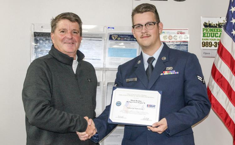 Pictured are Michigan Works! Region 7B Executive Director Mark L. Berdan and PATH Coordinator Airman 1st Class Hauk DeGeer. Michigan Works! Region 7B is proud of Hauk’s service, and our role in supporting him.