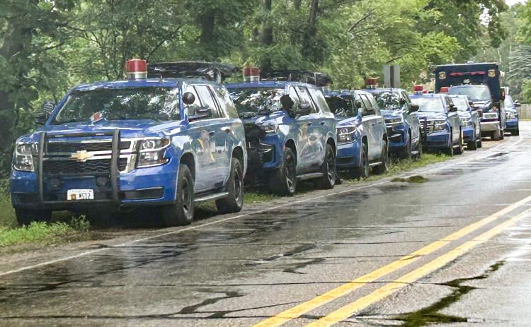POLICE USE MARINE SERVICE TEAM TO INVESTIGATE HOMICIDE