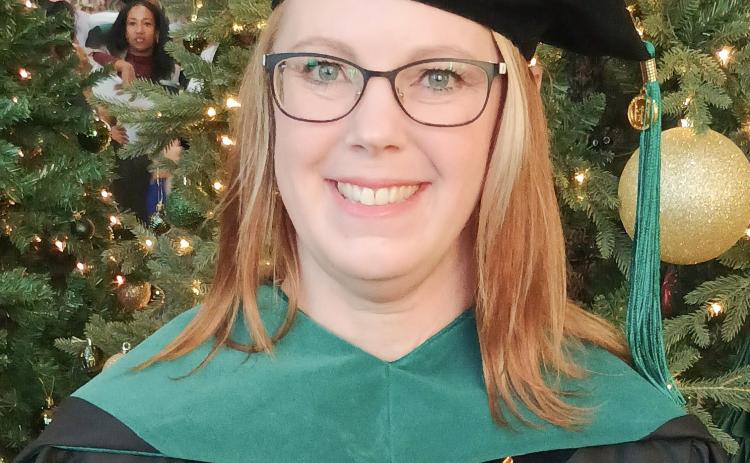 LUCKE RECEIVES PHD