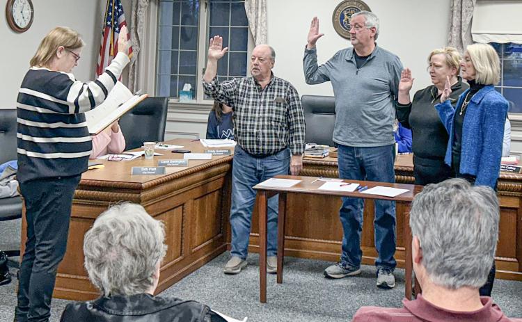 Gladwin City Council members Dave Crawford, John Caffery, Jamie Sischo, and Deb Platt were sworn in at the Gladwin City Council meeting on December 2.