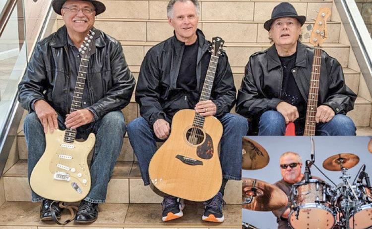 Pictured left to right are: Tom Tucholski, lead guitar; Lynn Morgan, vocalist and rhythm guitar; Dan Mercer, bass guitar; inset photo, Stacy Hill on drums.