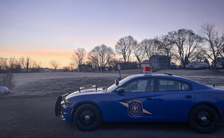 Trooper David Versin parks his patrol car in Crandell Park in Charlotte, which he said is a nighttime hangout where local teenagers sometimes go drinking.