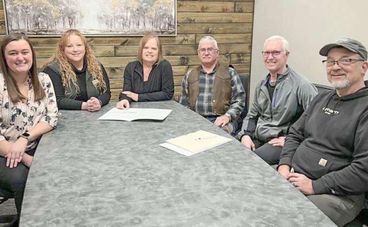 Pictured left to right: Carley Van Tiem of Superior Title, Gladwin Mayor Sarah Kile, City Clerk Marietta Andrist, and Skeels Christian School board members, Dave Cady, Mike Steinkraus, and Brent Hughey.