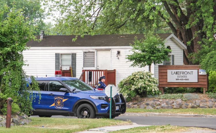 Early in the morning of June 6 a man was shot to death at 385 W. Brown St., at Lakefront Estates just west of downtown Beaverton. Police continue their active investigation into the matter. Pictured above: Michigan State Police Troopers block the entrance to the complex on Tuesday morning.