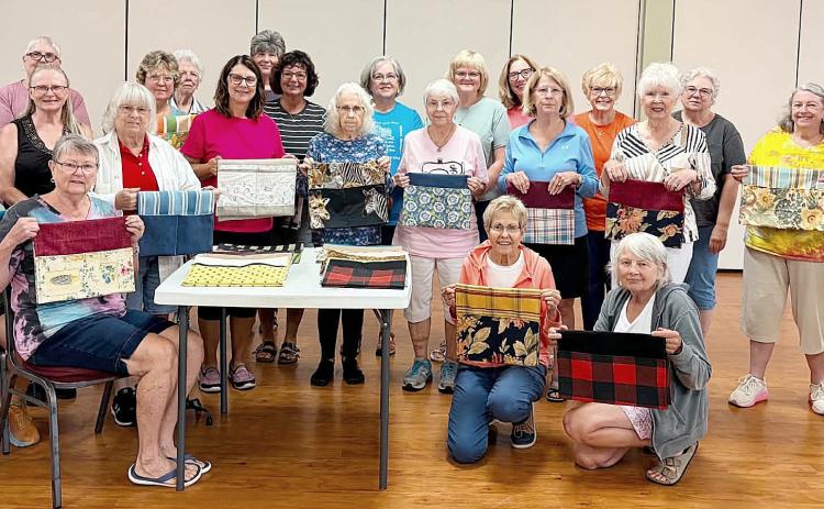 STITCHERS GATHER FOR SERVICE PROJECT